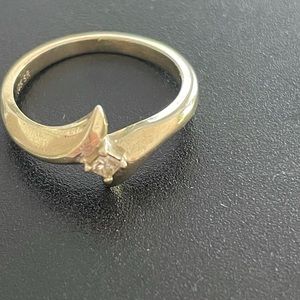 Mini 1/8 carat diamond and 18 carat gold ring